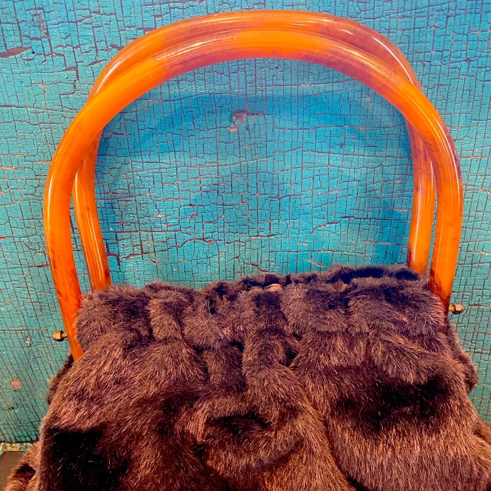 Vintage Faux Fur Morris Moskowitz tortoise bake light handled purse.